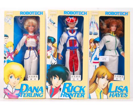 A set of 3x Harmony Gold made Anime ' Robotech ' 12" scale action figures. Lisa Hayes, Rick Hunter and Dana Sterling. All app