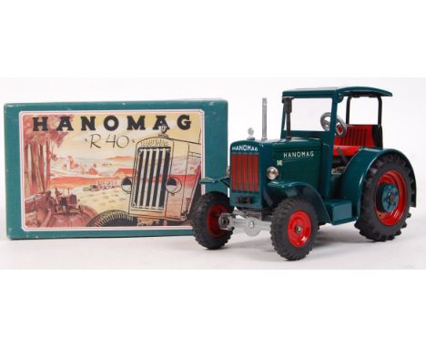 A fabulous 20th century German made tinplate clockwork Hanomag R40 tractor. Incredibly detailed model. With three speeds, han