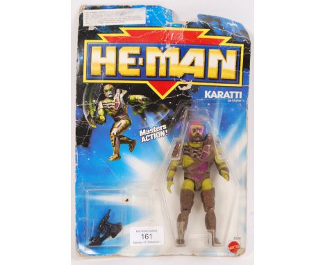 An original vintage 1980's He-Man / Heman Masters Of The Universe MOTU carded action figure of ' Karatti .' Made by Mattel. F