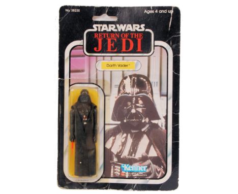 An original vintage Star Wars Kenner carded action figure of Darth Vader. Sealed, never opened, on the original 77 back Retur