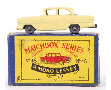 An original vintage Matchbox Moko Lesney diecast model. Rarer variation No. 45 Vauxhall Victor with Lemon body and grey plast