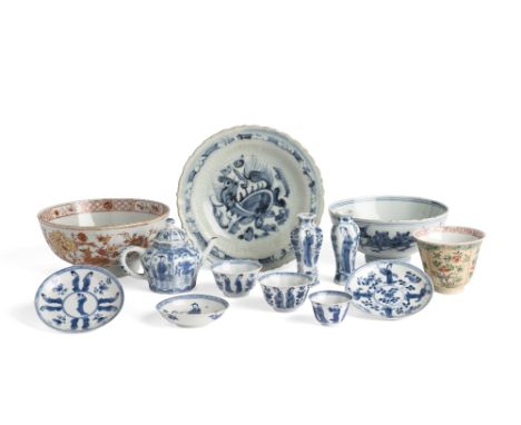 A group of Chinese porcelain 18th century and earlier Including a pair of Kangxi blue and white miniature vases and a similar