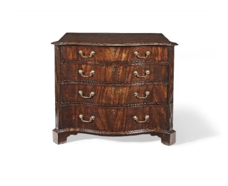 A George III mahogany serpentine commode The moulded top above a frieze drawer with a baize lined slide, above three further 