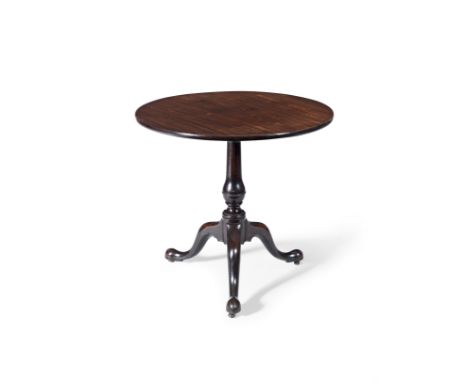 A George III mahogany tilt-top tripod tableOf typical form, the baluster column leading to three cabriole legs with pad feet,