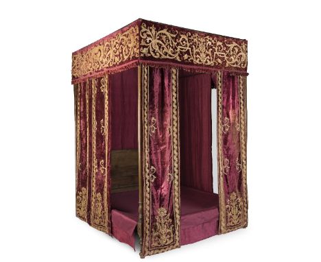 An impressive tester bed incorporating early 20th century hangingsThe walnut frame 20th centuryTogether with a base, the hang
