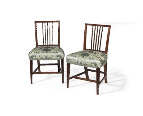 A pair of late George III mahogany chairs Late 18th century, in the manner of Gillows The rectangular moulded backs with stic