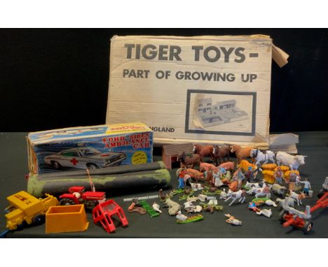 A Tiger Toys farm set, boxed,  Britain's Massey Ferguson tractor,  log wagon, animals etc;    Masudaya (Japan) tin plate Ford