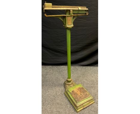 A set of cast iron weighing scales, presented to Woodford R.A.O.B (GLE) convalescent Home by the Portland Province October 19