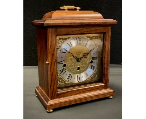 A Franz Hermle 8-day mantel clock, oak case, chiming movement. 