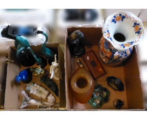 Two boxes of miscellaneous, including Oriental metal flask, Oriental vase, figurines, bird figures, vase, glassware and a woo