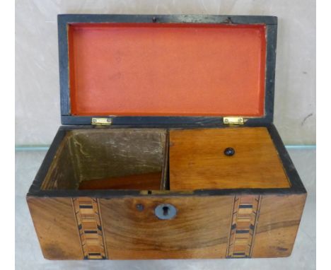 A walnut inlaid tea caddy