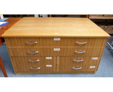 A modern light oak artist's supply chest incorporating 2 long drawers, 4 half width drawers to one side and cupboards to the 