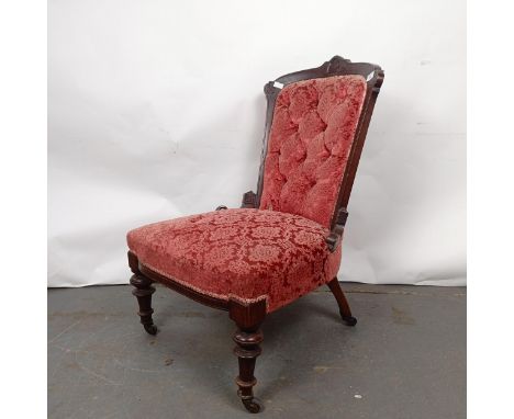 A late 19th century walnut framed button back nursing chairStructurally sound, general wear, in need of reupholstering
