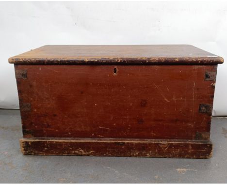 A Victorian stained pine trunk, with metal mounts, 84 cm wideGeneral wear due to use, variation of colour throughout
