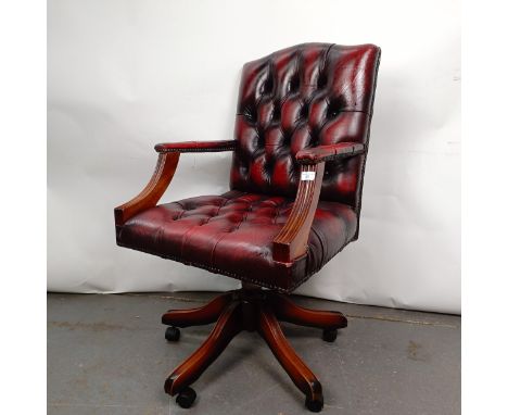 A mahogany and red leather button back office chairGeneral wear