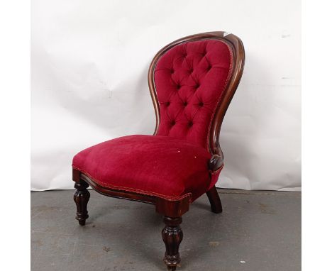 A Victorian mahogany framed button back nursing chairFrame loose, in need of reupholstering, general wear