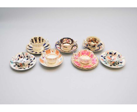 A group of English porcelain teacups and saucersearly-mid 19th centurycomprising a Coalport striped blue and gilt Adelaide-sh