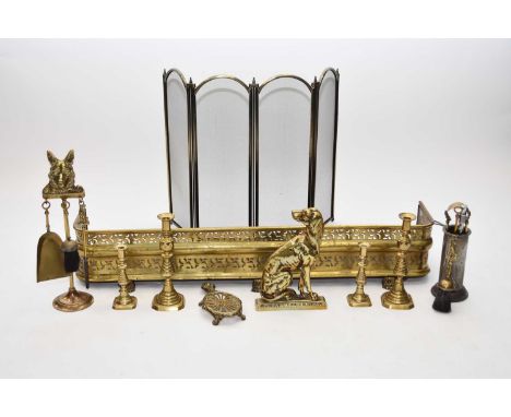 A 19th century fire curb, of D form with pierced decoration and raised on three claw feet, 120cm wide x 27cm deep x 22cm high
