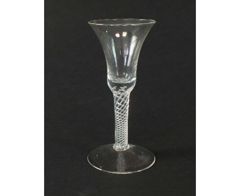 An 18th-century wine glass circa 1750the waisted bell bowl with a multi-series air twist stem, the twist extending into the b