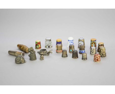 A collection of white metal, enamel, gilt and ceramic thimbles, to include; a floral enamel example stamped '925M', a swan de