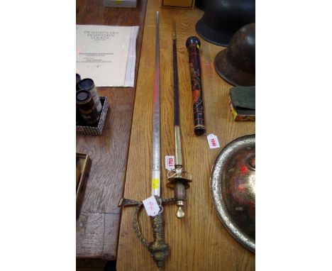 A court sword and scabbard, by H Lamb, St John's Square, Clerkenwell, London; together with another brass handled sword. 