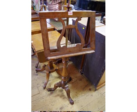 A mahogany tripod music stand,&nbsp;122cm high. 