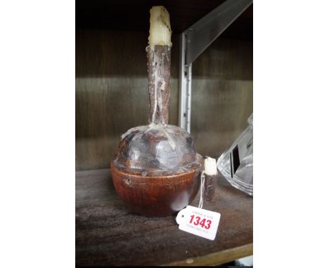 An antique treen candlestick and rushlight holder,&nbsp;19cm high. 