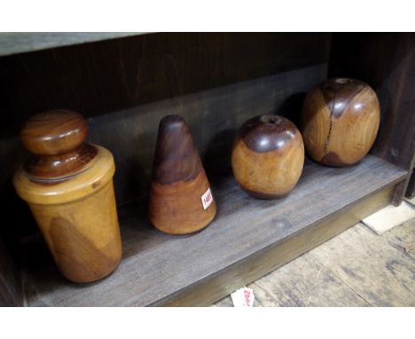 Four 19th century lignum vitae plumbers' tools or moulds, largest 22.5cm high. 