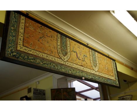 A large late 19th century Chinese silk embroidered altar panel,&nbsp;42.5 x 187cm. 