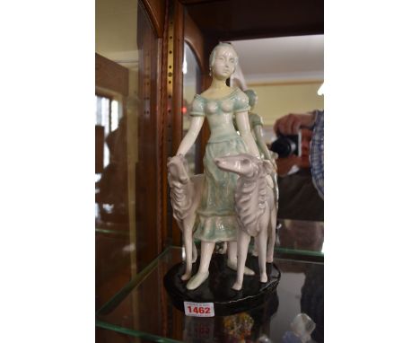 A Goldscheider figure of lady with two Borzoi,&nbsp;No 6870, 30cm high, (restoration to neck). 