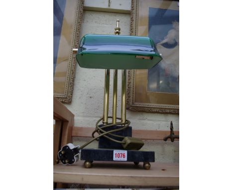 A brass and marble desk lamp.&nbsp; 