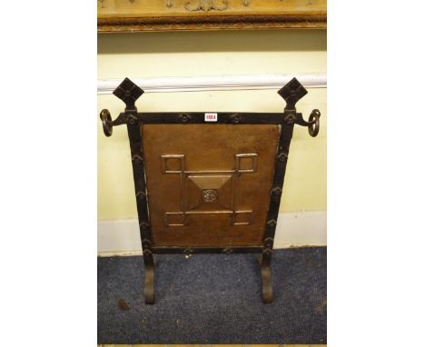 An Arts &amp; Crafts copper and steel firescreen,&nbsp;57cm wide.&nbsp; 