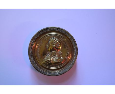 A 19th century George III commemorative brass circular snuff box and cover,&nbsp;7.5cm diameter.&nbsp;A 19th century brass ci