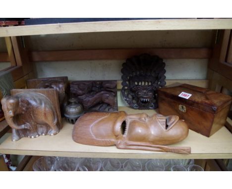 A Regency mahogany sarcophagus tea caddy, 19.5cm wide; together with a pair of hardwood elephant book ends; and other Eastern