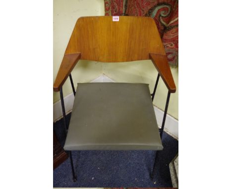A pair of vintage plywood and tubular steel elbow chairs. 