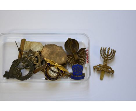 A rare The Royal Fusiliers 'Jewish Legion' cap badge,&nbsp;together with eight other medals and badges.The Jewish Legion (191