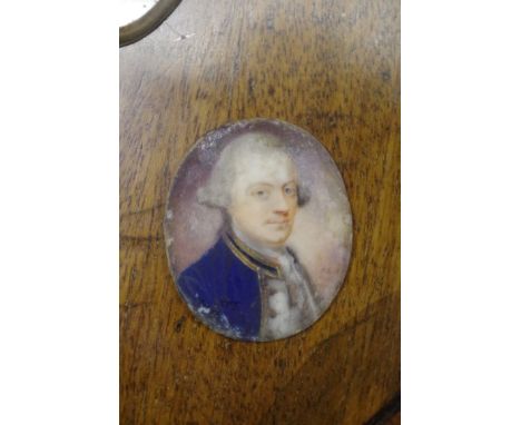 Attributed to Thomas Redmond,&nbsp;head and shoulders portrait miniature of a gentleman wearing a blue jacket with gold braid