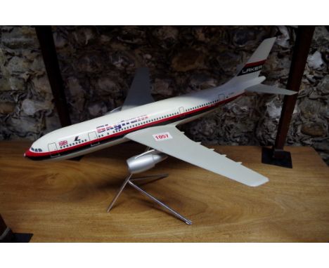 A model of a Laker A300 'Skytrain' aeroplane,&nbsp;wingspan 46cm, on stand. 