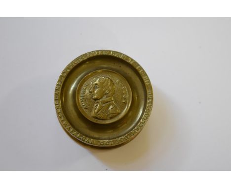 A brass Battle of Trafalgar snuff box and cover,&nbsp;7cm diameter.&nbsp; 