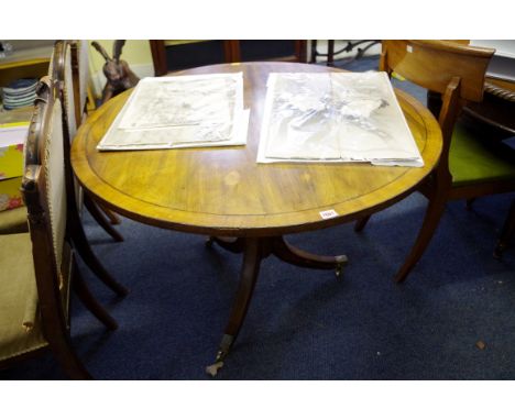 An antique mahogany and crossbanded circular tripod table,&nbsp;103cm diameter.&nbsp; 
