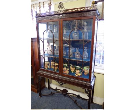 A late 19th century carved mahogany display cabinet,&nbsp;&nbsp;in the Chippendale style, 124cm wide. 