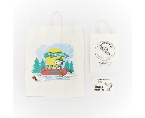 Group of three items relating to Camp Snoopy. One gift bag from Snoopy's Gallery and Gift Shop and one gift bag from Minnesot