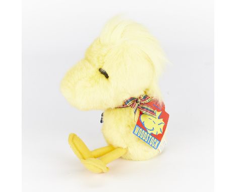 One plush doll of Woodstock with a plaid bow. Produced by Applause and with original tags attached.Height: 12 in x width: 4 1