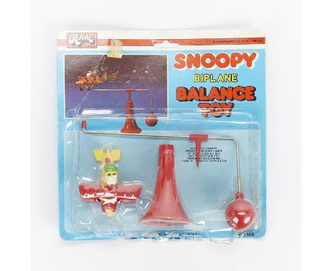 Snoopy biplane balance toy depicting the iconic Peanuts beagle as the Flying Ace. Produced by Aviva, ca. 1965. With the origi