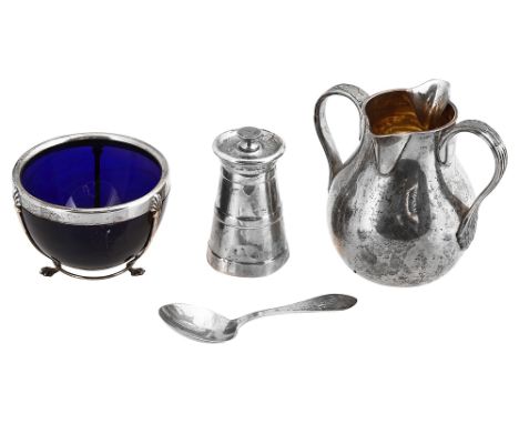 A late Victorian silver double spouted cream jug, a novelty pepper mill and a Canadian silver mounted blue sugar basin and sp