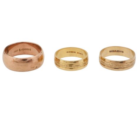 A 18ct gold band engraved abstract design marked Ô750Õ together with two 9ct gold bands marked Ô9.375Õ (3)approx. weight 11.4