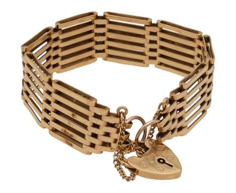 A 9ct gold gate bracelet stamped to bars '9.375', with a padlock heart, stamped '9.375' and safety chain approx weight 28.3gC