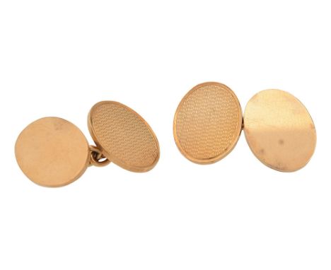 A pair of 9ct gold cufflinks engine turned decoration, stamped '375' to the reverse (2)total weight approx. 13.2gCondition: I