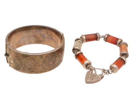 A Victorian Scottish hardstone  'pebble' bracelet, composed of six faceted cylindrical links including carnelian, each with s