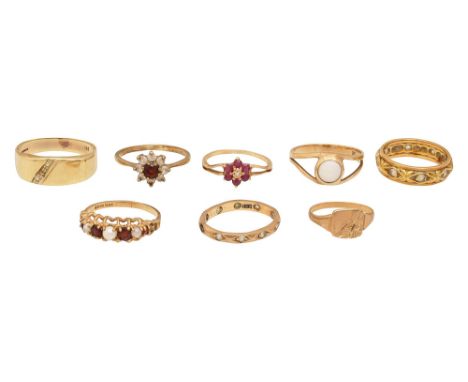 An assortment of 9ct gold ringsincluding a 9ct gold ruby and diamond chip cluster ring stamped '375', 9ct gold garnet and col